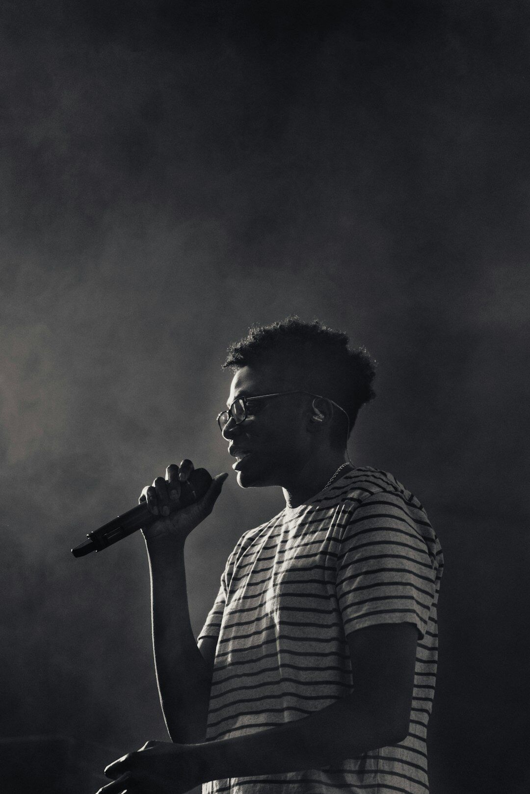 Uruguayan pop singer performing on stage with a microphone